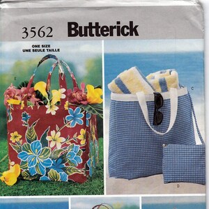May include: A sewing pattern for five different tote bags. The bags are shown in various fabrics and colors, including a floral print, a blue and white gingham, a clear mesh, a blue denim, and a striped fabric. The pattern is for one size and is called "Butterick 3562".
