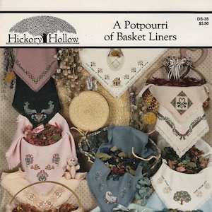 May include: A collection of potpourri basket liners in various colors, including pink, blue, and white. Each liner features embroidered designs, such as floral patterns, trees, and geometric shapes. The image includes the text "Hickory Hollow" and "A Potpourri of Basket Liners".