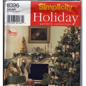May include: A Simplicity Holiday pattern collection featuring a Christmas tree decorated with bows and ornaments, a fireplace with stockings, and a table setting with a floral tablecloth. The pattern number is 8396.