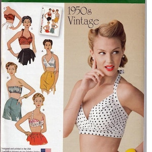 May include: Simplicity sewing pattern 1426 R5 for vintage 1950s style tops and skirts. The pattern includes illustrations of various designs, with a woman wearing a polka dot halter top. The size range is U.S. 14-22.