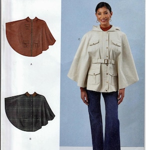 May include: Simplicity sewing pattern S3033 featuring cape designs. The pattern includes a hooded cape with a belt, and two other cape variations. The pattern is designed and printed in the USA.