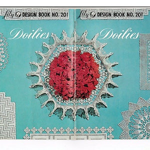 May include: A vintage design book titled "Doilies" with a teal cover. The cover features various white lace doily designs, including a large hexagonal one with a red floral center. The text "Lily Design Book No. 201" is visible.