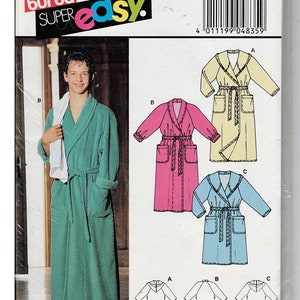 May include: A sewing pattern for a robe with three different styles. The pattern is for sizes 10-16 and includes instructions for making a green, pink, and blue robe. The pattern is from Burda Super Easy and has the number 4835 on it.