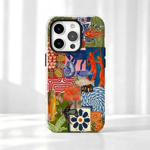 May include: A smartphone case featuring a vibrant collage of diverse illustrations, including a blue snail, orange fish, red floral shapes, a dark blue horse, dancing figures, and a geometric flower pattern in blue, white, and orange on a green background.