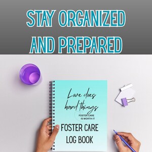 May include: A spiral-bound "Foster Care Log Book" with the text "Love does hard things" and "Foster Care is worth it". The image also includes the text "Stay Organized and Prepared". A purple cup, a pen, and a paper clip are also visible.