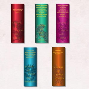 May include: Set of five colorful bookmarks with quotes and titles from the "A Court of Thorns and Roses" book series. Each bookmark features a gradient background and decorative illustrations. The text includes quotes and book titles.