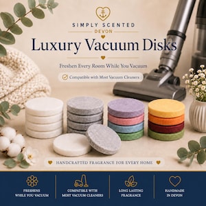 May include: Simply Scented Devon Luxury Vacuum Disks are round, flat, scented discs in white, gray, purple, pink, blue, green, yellow, orange, and red. The text reads Simply Scented Devon Luxury Vacuum Disks, Freshen Every Room While You Vacuum.
