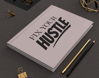 Quaderno motivazionale Fix Your Hustle con copertina rigida e opaca.