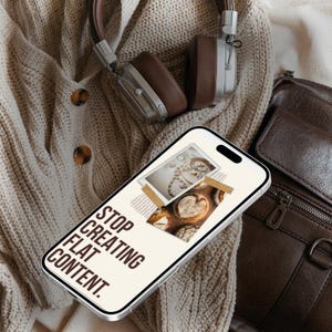 May include: A smartphone displays the text "STOP CREATING FLAT CONTENT" over a collage of images. A brown leather bag, headphones, and a beige knit cardigan with brown buttons are also in the image.