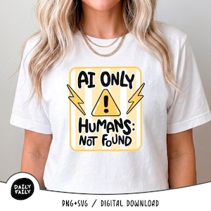 May include: A white t-shirt featuring a graphic with a yellow and white striped background. The text reads AI ONLY HUMANS: NOT FOUND in black, with a yellow warning triangle containing an exclamation point and two yellow lightning bolts.