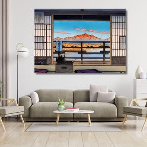 May include: A rectangular wall art print depicting a view from a traditional Japanese room with sliding shoji screens looking out onto a mountain range under a blue sky with pink clouds. A black teapot sits on a wooden chest in the foreground.