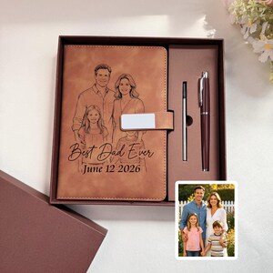 May include: A brown leather journal with a family portrait and the text "Best Dad Ever June 12 2026" is displayed in an open gift box. A pen and a stylus are also included. A small photo of the family is in the lower right corner.