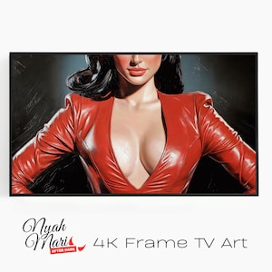 May include: A framed artwork featuring a woman in a red leather jacket with a plunging neckline. The art has a dark background and the text "Nyah Mari After Dark" and "4K Frame TV Art" at the bottom.