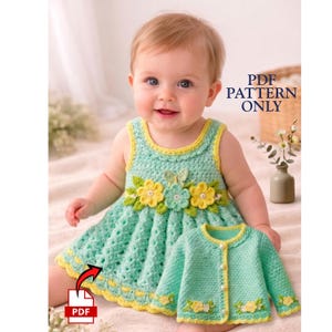 May include: A mint green crochet baby dress and matching cardigan set with yellow floral accents. The dress has a sleeveless design with a round neckline and a flared skirt. The cardigan has a button-up front and is adorned with floral details. The text "PDF PATTERN ONLY" is visible.