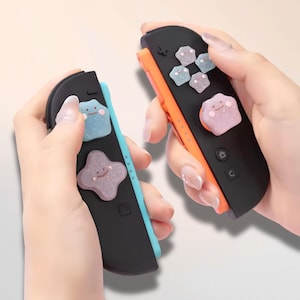 Botones ABXY de silicona de Pokémon Ditto (Cambiaformas) para Joy-Con 2 de Nintendo Switch, temática pastel, estilo adorable, hechos a mano.