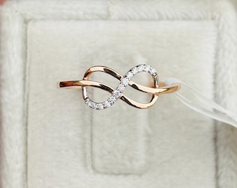 Anillo de oro de 18 quilates con diamantes y diseño infinito, banda minimalista con claridad VVS, joyería fina para aniversarios y promesas.