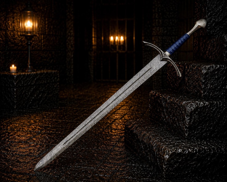 May include: A long sword with a patterned Damascus steel blade, a silver-toned crossguard, and a blue wrapped grip. The pommel is rounded and metallic, and the blade features a distinct wavy, layered metal texture running along its entire length.