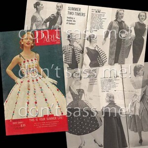 May include: A vintage magazine ad featuring a woman wearing a white dress with colorful floral embroidery. The ad is for a clothing store called "Paris Shop" and features the text "This is your summer life!" and "Summer Two-Timers leading a double life of fashion!"