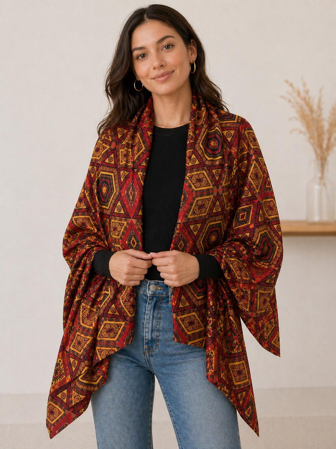 Woman wearing an African-print silk scarf as a luxury travel accessory and resort wrap