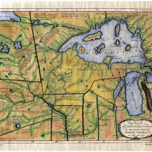 May include: A vintage map of the interior parts of North America, showing the territories of the Chippewa, Naudowessie, and Ottawawma tribes. The map is hand-drawn and colored in shades of green, brown, and blue. It includes text labels for various locations and features, such as "Lake Superior" and "The Mississippi River."