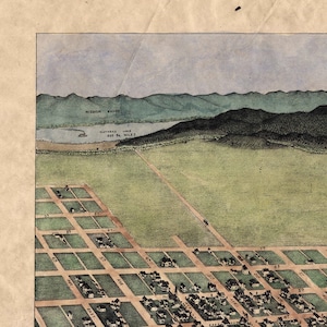 May include: An antique map of a town with a grid layout. The map shows streets, buildings, and a lake. The text "CATHEDRAL LAKE 600 SQ. MILES" is visible on the map.