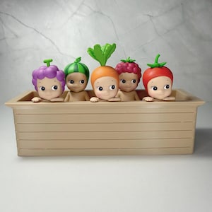 May include: A distressed white wooden sign displaying the word "Welcome" in a handwritten font. The sign has a rustic appearance with a floral design. Suitable for indoor or outdoor use, it adds a welcoming touch.