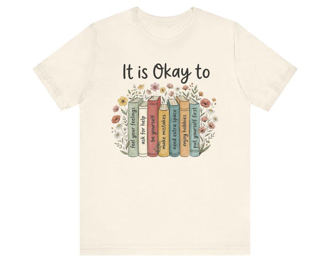 It Is Okay To Book Graphic Tee | Mental Health | Stack of Books