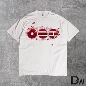 May include: White t-shirt with a red graphic design. The design features three circular shapes with a floral pattern. The first circle has a hole in the center, the second has horizontal lines, and the third has a horizontal and vertical line.