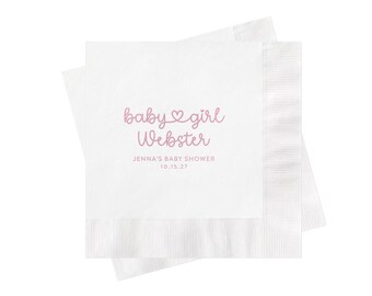 May include: A square white paper napkin with a textured border. The center features pink text that reads baby girl with a heart icon, followed by Webster, and the text JENNA'S BABY SHOWER 10.15.27 printed in a smaller, clean sans-serif font.