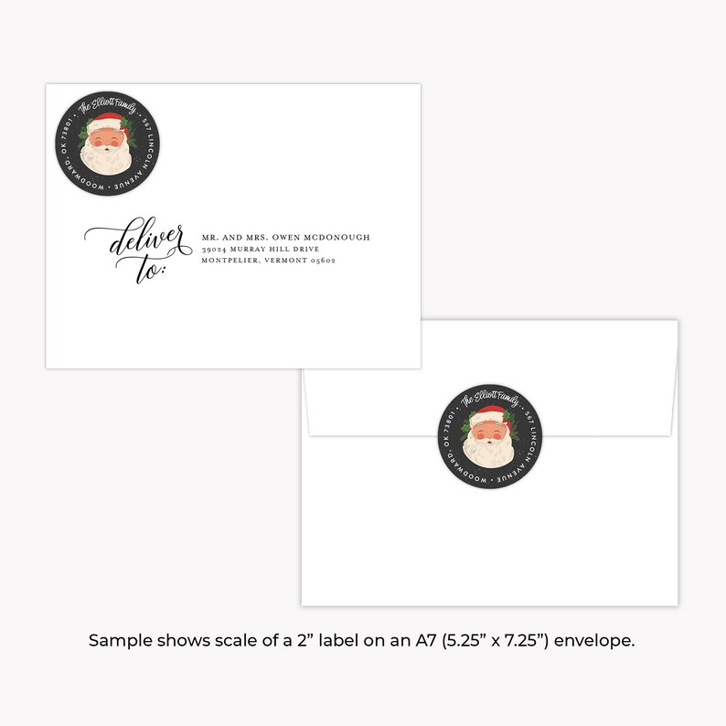 May include: A white envelope with a black and white Santa Claus sticker. The envelope has a handwritten address label that reads "deliver to" followed by a name and address. The text "Sample shows scale of a 2" label on an A7 (5.25" x 7.25") envelope." is printed below the envelope.