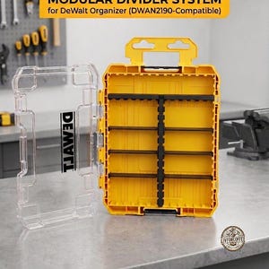 May include: A yellow and clear modular divider system for a DeWalt organizer. The yellow case is open, revealing black dividers and shelves. The clear lid is open to the side, with the word "DEMVII" printed on it. The text "MODULAR DIVIDER SYSTEM" is at the top.