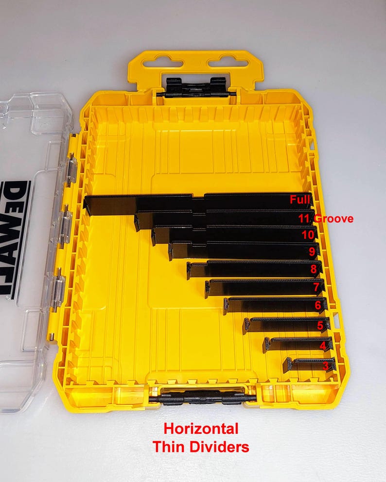 May include: Yellow and black tool organizer with clear lid. The organizer contains black horizontal thin dividers labeled with numbers and the word "Groove". The text "Horizontal Thin Dividers" is visible at the bottom. The brand name "DEWALT" is printed on the clear lid.