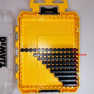May include: Yellow and black tool organizer case, open to reveal black tool holders. The case has a handle and a clear plastic lid. Text on the case reads "Horizontal Spine" and "Full Groove".