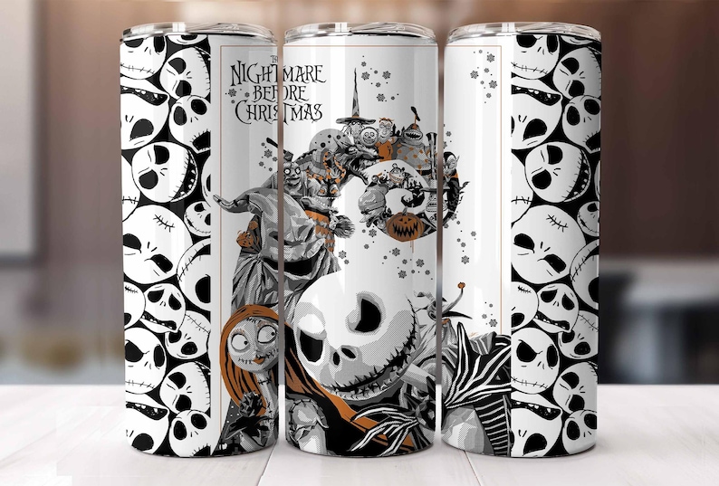 May include: A white tumbler featuring characters from "The Nightmare Before Christmas." The design includes Jack Skellington, Sally, and other characters in a grayscale and orange color scheme. The tumbler also has a pattern of Jack Skellington's face.