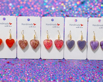 Aanpasbare harshartoorbellen: gouden hanger met hagelslag of vlokken