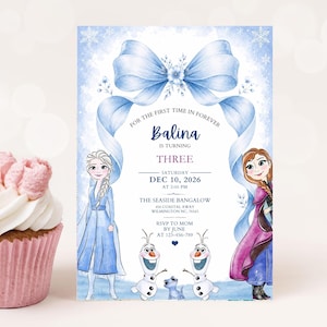May include: A rectangular birthday invitation card featuring a large light blue bow at the top, illustrations of two animated characters, and two snowmen. The text reads: For the first time in forever, Balina is turning three, Saturday Dec 10, 2026.