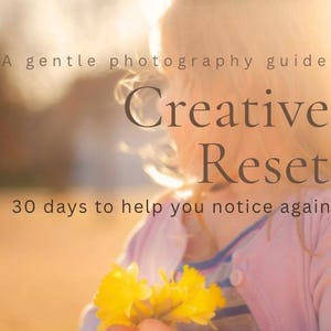 May include: Image of a child holding a bouquet of bright yellow flowers. The text on the image reads "A gentle photography guide Creative Reset 30 days to help you notice again."