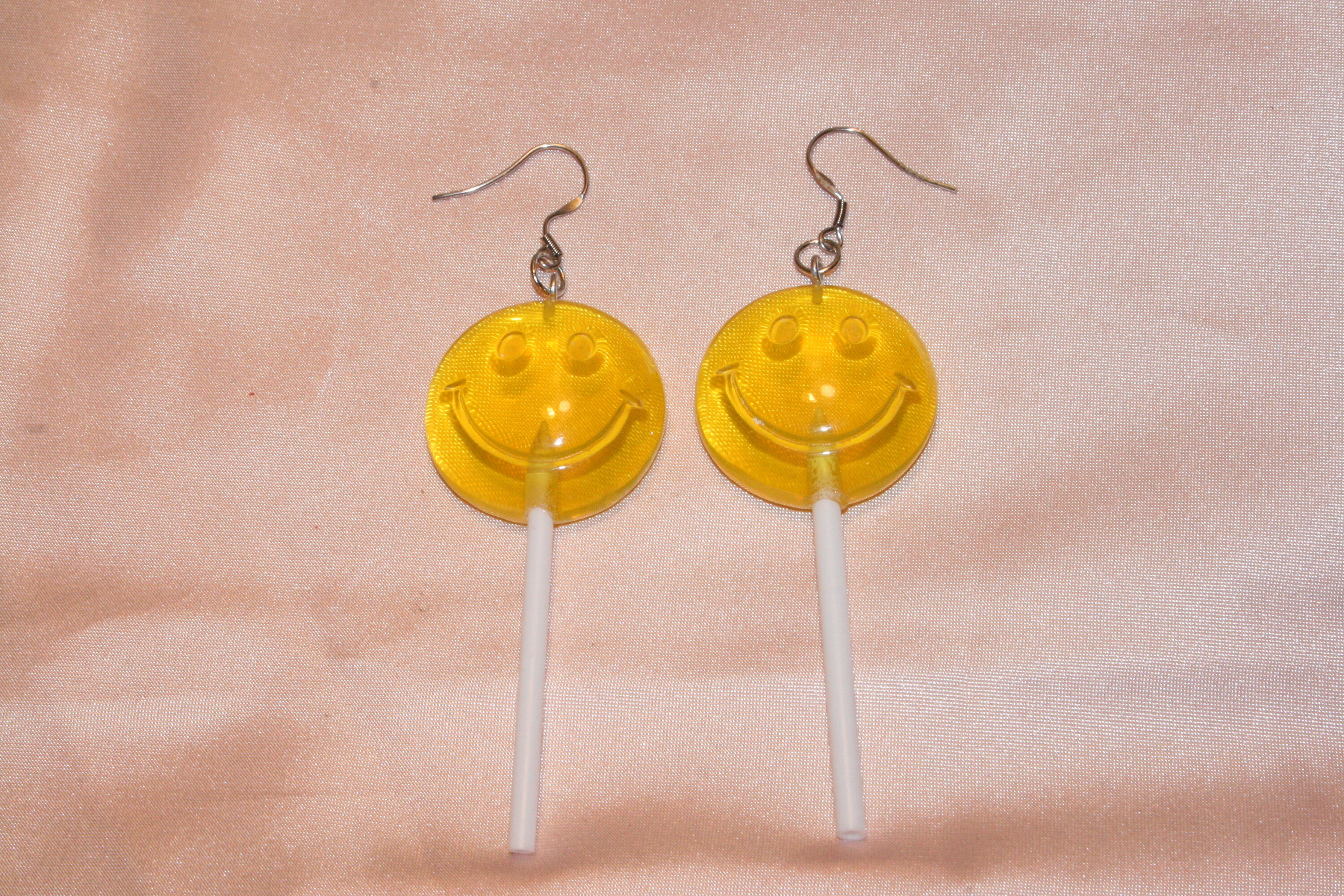 Striped mini lollipop earrings∴ Fiorucci Mini Lollipop Earrings | White | FARFETCH EG