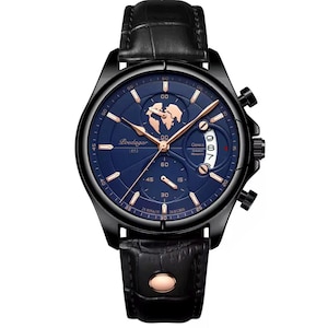 May include: Black wristwatch with a blue face and a black leather band. The watch face features gold-colored hands and markers, with the brand name "Poedagar" and the text "1853". The watch has a date display and a world map design.