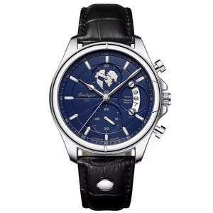 May include: A silver-toned wristwatch with a dark blue face and black leather band. The watch face features a world map design, sub-dials, and the text "Poedagar 1853". The watch has a date display and a textured black leather strap.