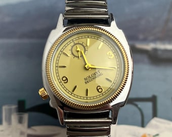Dwukolorowy zegarek w stylu vintage z żółtą tarczą i rozciągliwym paskiem ze stali nierdzewnej