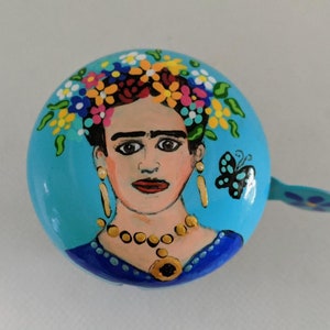 Frida Kahol, bike bell, painted bike bell, Mexican painter, Diego Rivera, folk art, naive art style, custom portraits, bicycle bell