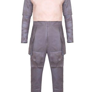 May include: A full costume featuring a light pink top and gray pants with large pockets. The top has a high collar and shoulder pads. The pants have knee pads and pockets. The costume is designed for cosplay or themed events.