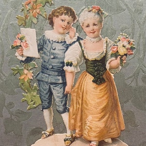 Carte postale ancienne des années 1900, personnages et images découpés.  Affranchi en 1907.