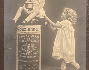 Postal infantil victoriana, publicidad para Saxlehner