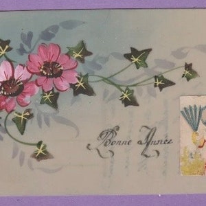 Antieke Franse celluloid ansichtkaart, spray van roze bloemen Bonne Annee Franked, geschreven 1925