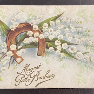 Cartolina del primo maggio, mughetto, ferro di cavallo, buona fortuna, scritta su carta antica, circa anni '10