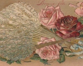 Embossed French Antique Postcard, Fan Made from Feathers, Lying Next to Red and Pink Roses, 1900s