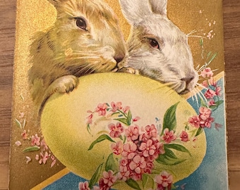Antique Easter Postcard featuring two Easter Bunnies Guarding Their Egg, Embossed, Made in the USA