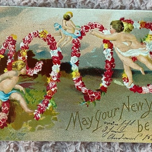 Tłoczona antyczna niemiecka pocztówka, kwiaty cherubiny 1908